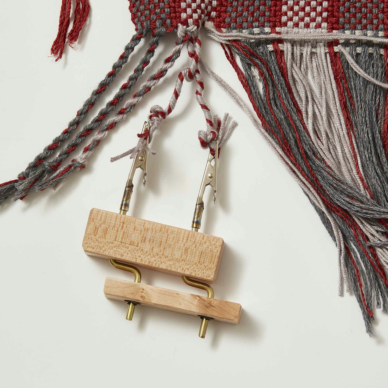 Twist the warp until the bundles start to kink. George Boe