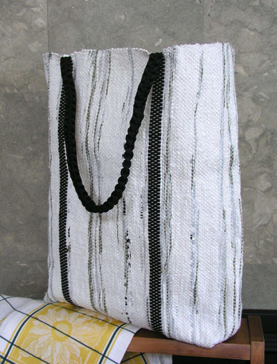 Learn about plastic bag weaving by creating a tote from recycled plastic bags found in our eBook on recycled yarn projects.